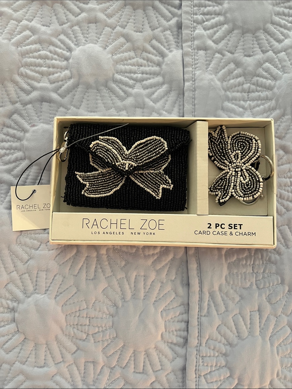 Rachel Zoe Black and Ivory Beaded Card Case with Bow Charm